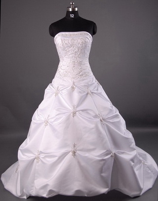 Wedding Dresses Wedding Dress Multiple layers and textures are prominent