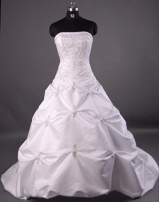 Wedding Dresses Wedding Dress Multiple layers and textures are prominent 